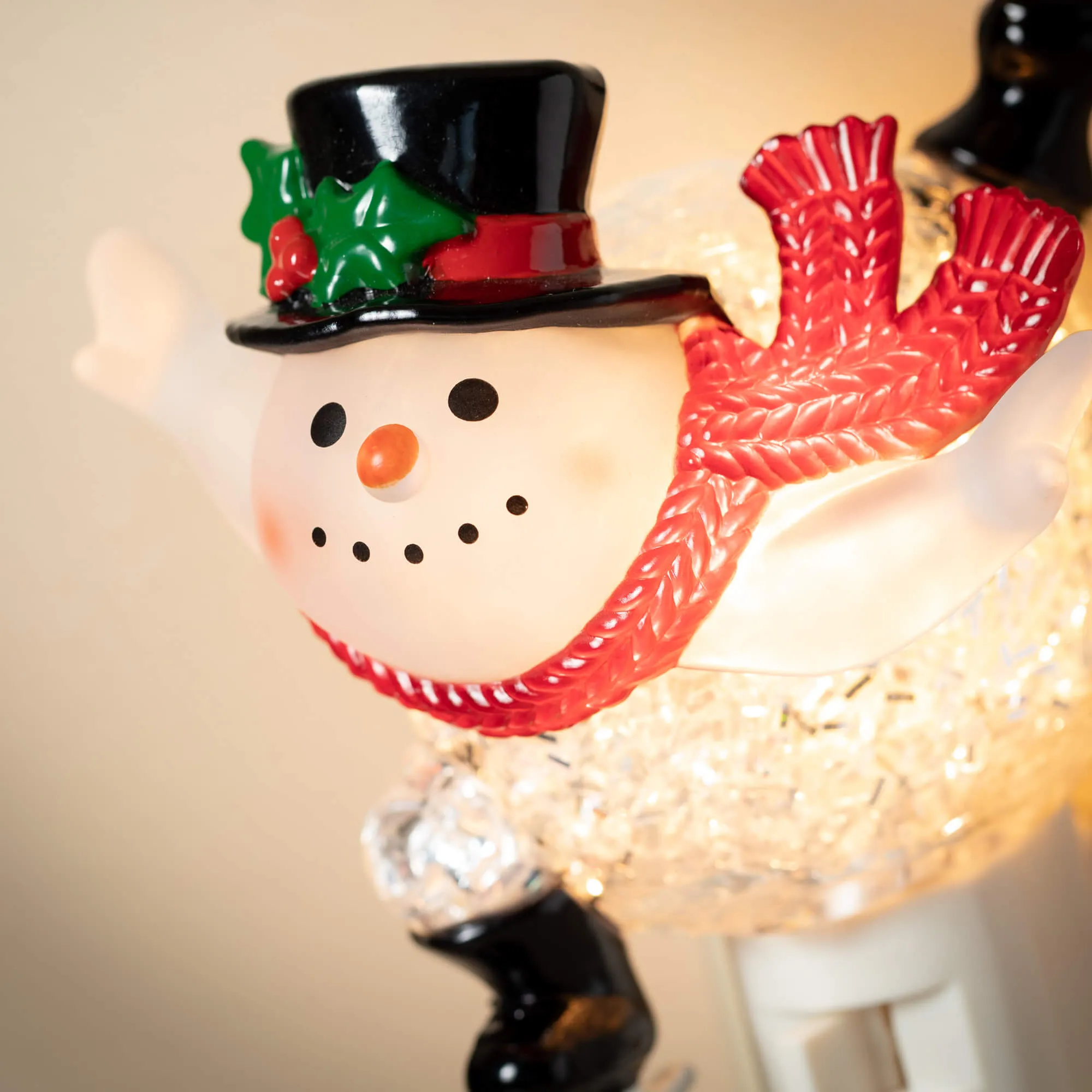 5"H Sullivans Ice Skating Snowman Nightlight, Multicolored